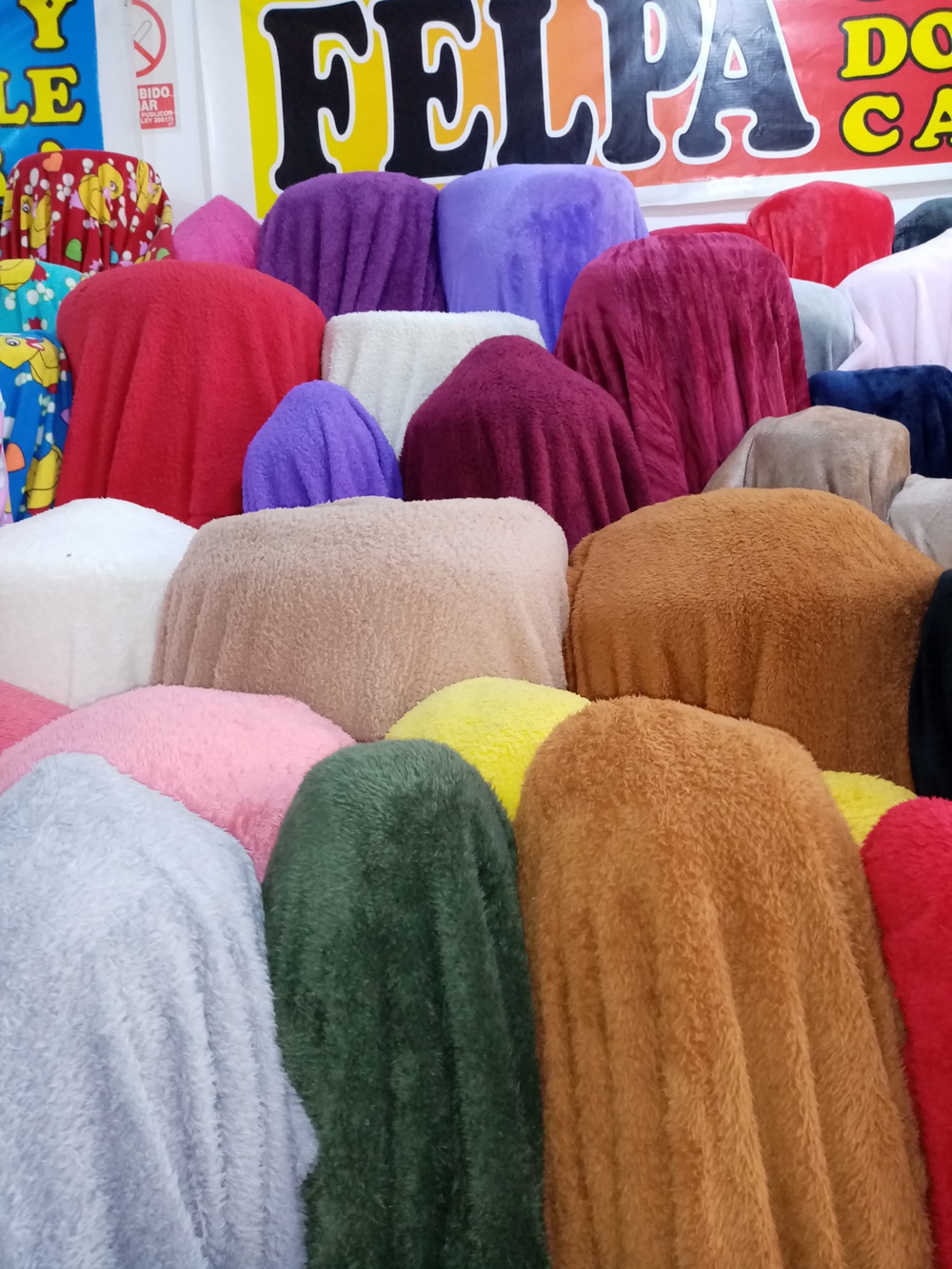 PELUCHE DOBLE CARA-COLORES